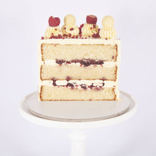 Load image into Gallery viewer, WHITE CHOCOLATE &amp; RASPBERRY CAKE